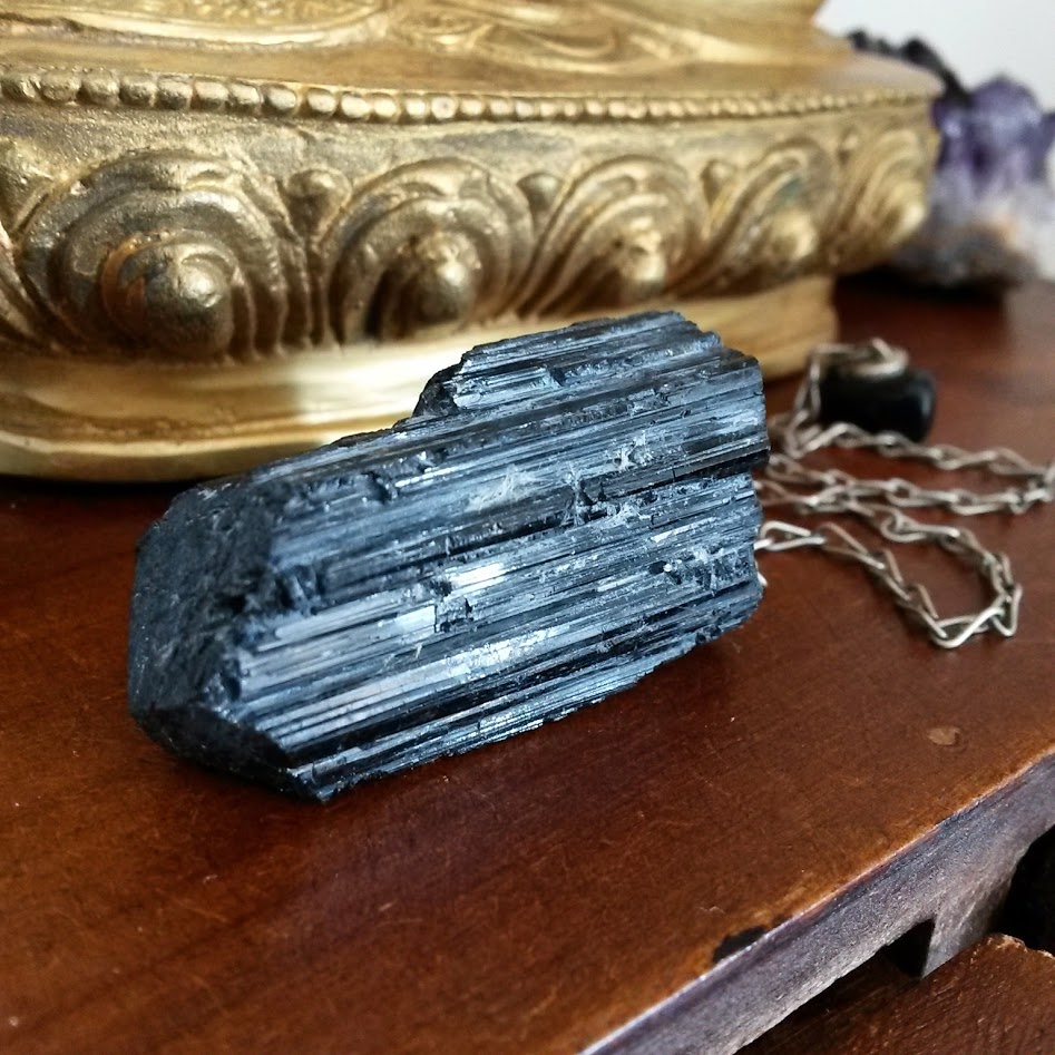 Black Tourmaline absorbs and grounds negative energies