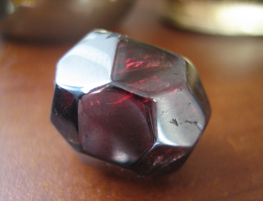 Faceted Almandine Garnet crystal