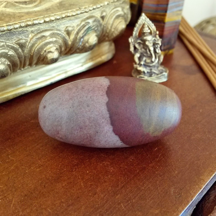Shiva Lingam stone with Ganesha statue