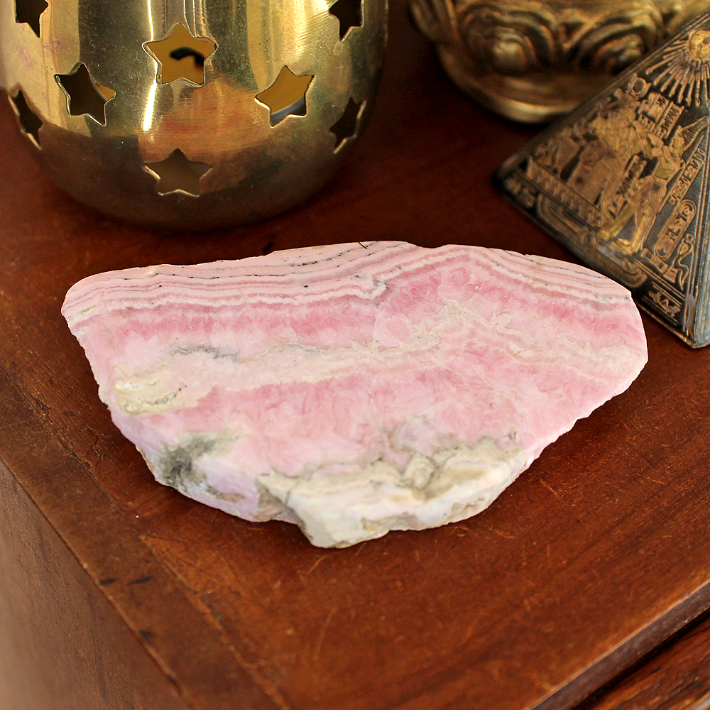 Rhodochrosite is banded with light and or deep pink