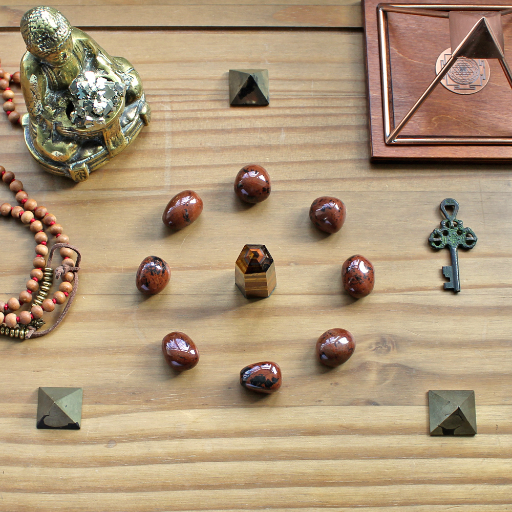 This crystal grid for success uses very earthy crystals