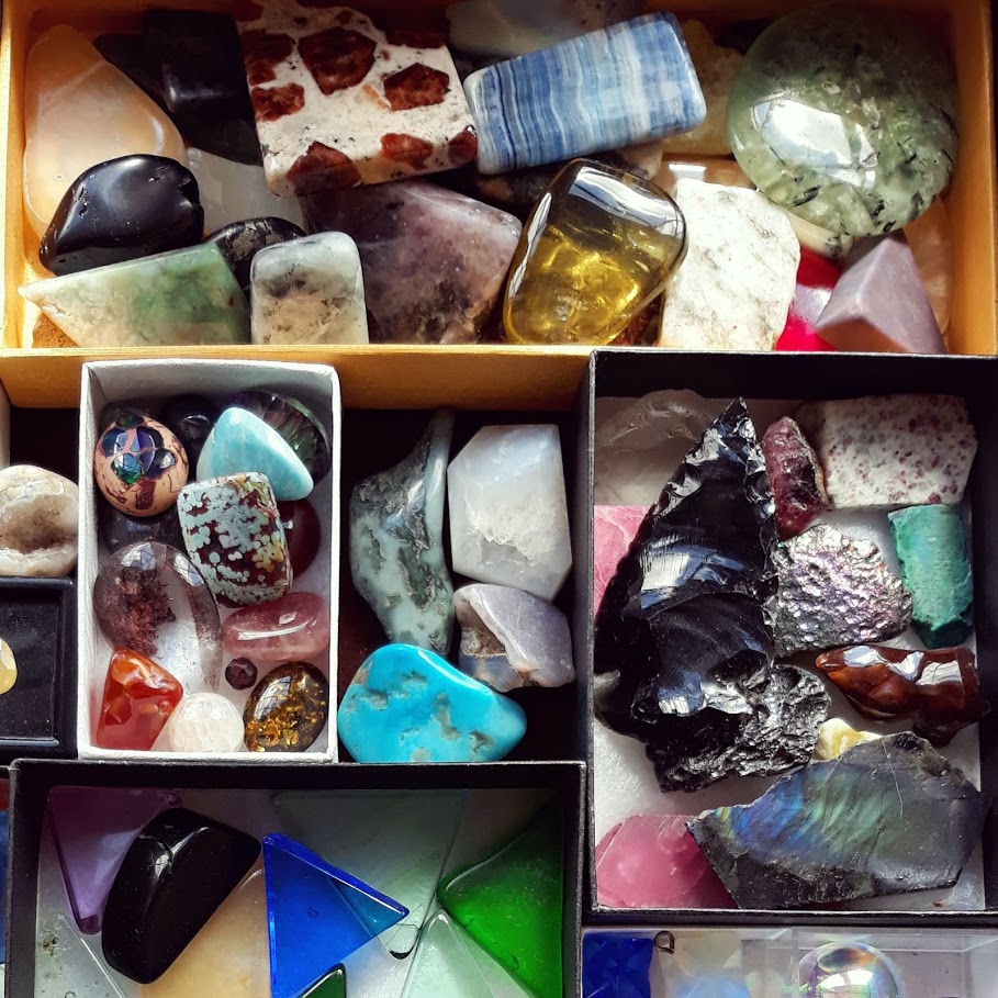 drawer filled with different crystals and gemstones