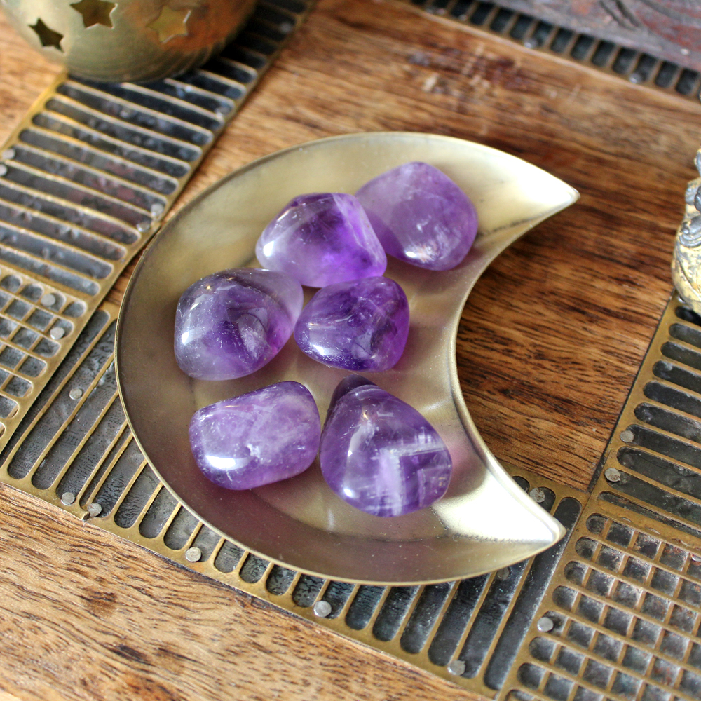 Amethyst tumbled stone in a brass cresent moon bowl